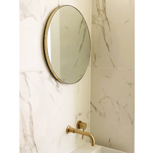 Round Orbis Round Mirror With a Brass Frame