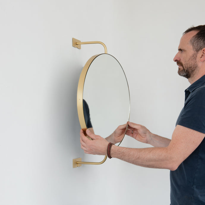 NEW Vorso™ Wall Attached Suspended Rotating Round Mirror with a Brushed Brass Frame