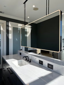 Illuminated Quadris™ Ceiling Suspended Rectangular Bathroom Island Mirror, Blackened Metal Frame