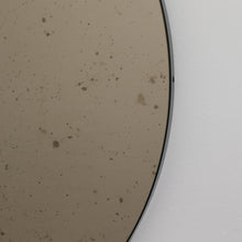 Orbis™ Antiqued Bronze Tinted Round Elegant Mirror with a Black Frame