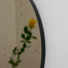 Orbis™ Antiqued Bronze Tinted Round Elegant Mirror with a Black Frame