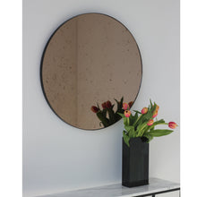 In Stock Orbis™ Antiqued Bronze Tinted Round Elegant Mirror with a Black Frame