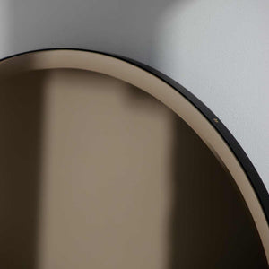 In Stock Orbis™ Bevelled Bronze Tinted Round Mirror with a Black Metal Frame